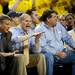Michigan head coach John Beilein sits next to Michigan football head coach Brady Hoke during the game against Illinois on Sunday, Feb. 24. Daniel Brenner I AnnArbor.com